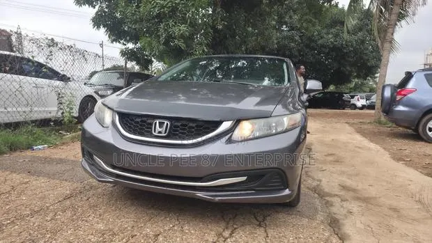 Honda Civic EX-L 2dr Coupe (1.8L 4cyl CVT) 2015 Gray · Photo 1