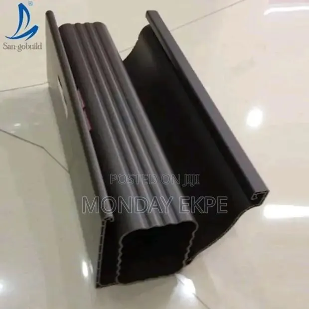 Brown PVC Rain Gutter and Accessories · Photo 1