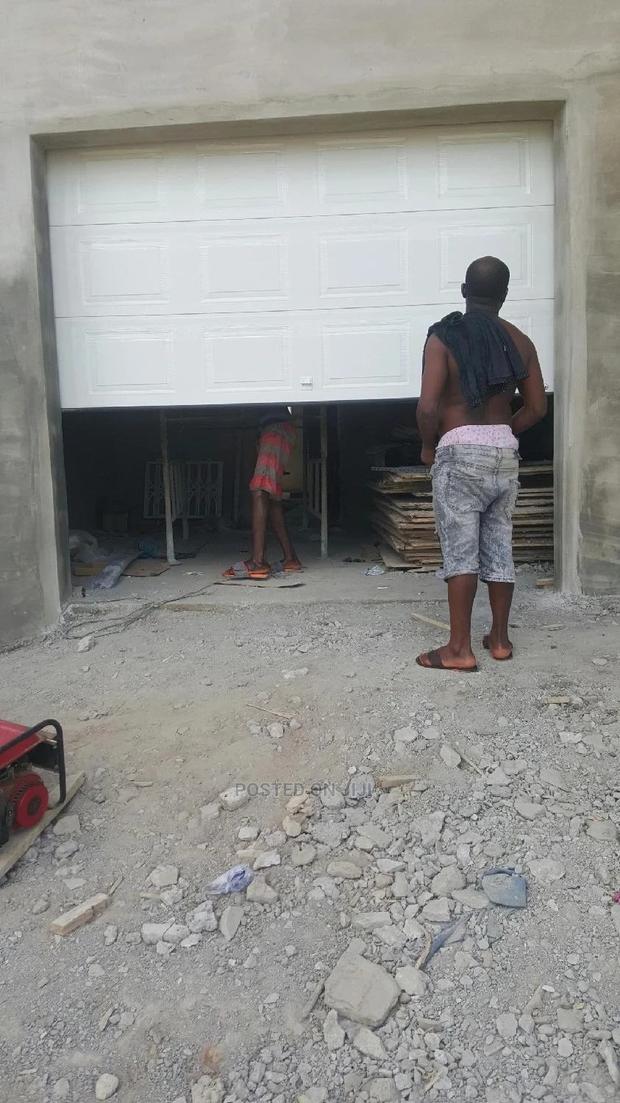 Automatic Garage Door With Backup Battery · Photo 5