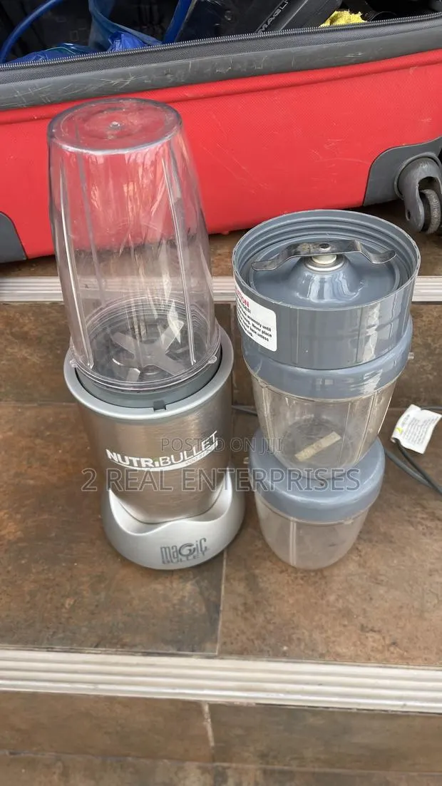 NutriBullet Pro 900-Watt High-Speed Blender Base With 3 Cups · Photo 1