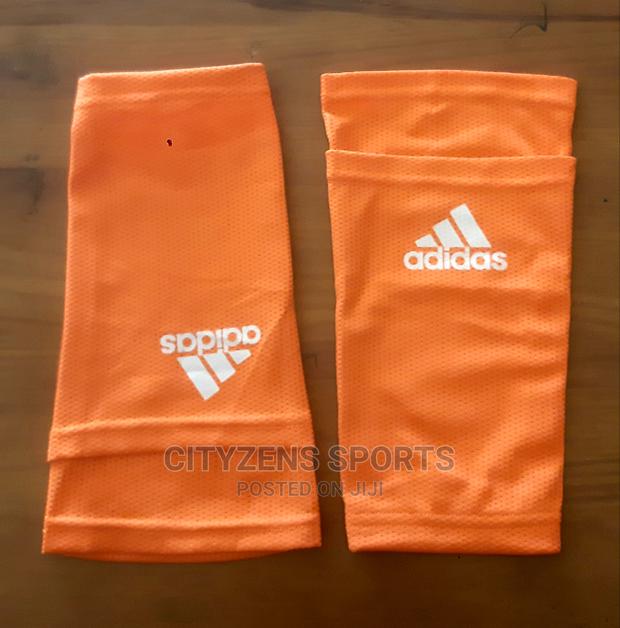 Orange Shinquard Sleeves · Photo 1