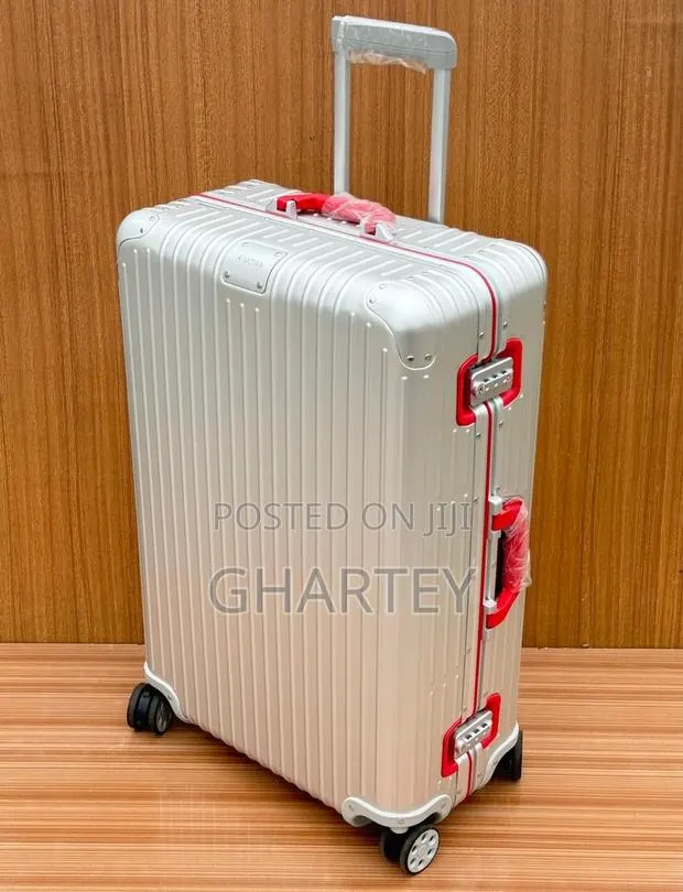 Rimowa Two Toned Silver Red Handle Travel Suitcase · Photo 1