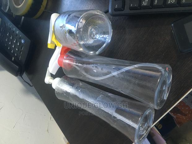 Spraying Rubbing Liquid Sanitizer Bottles With Sprayer · Photo 5