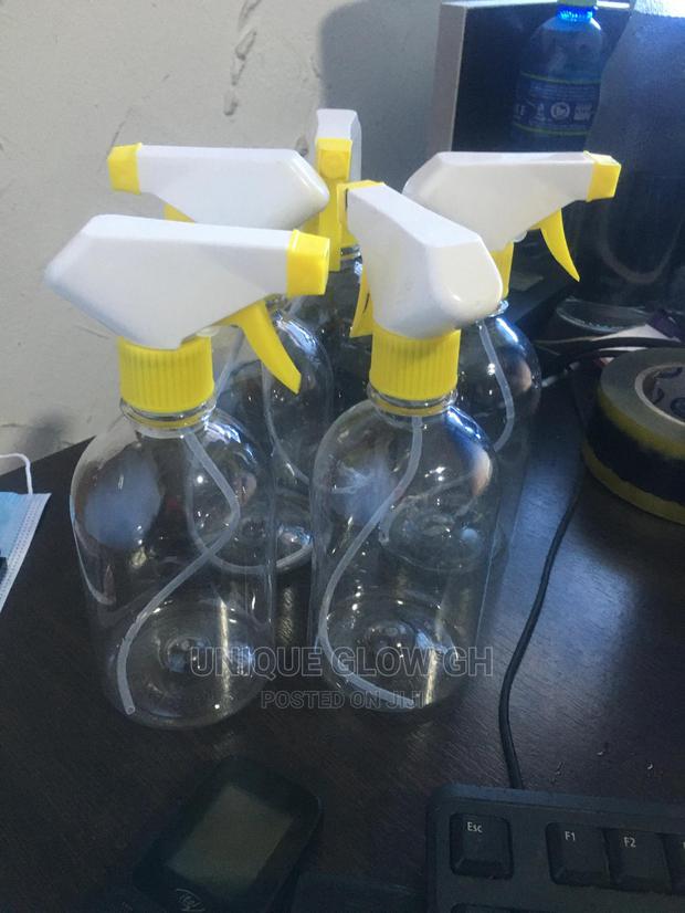Spraying Rubbing Liquid Sanitizer Bottles With Sprayer · Photo 2