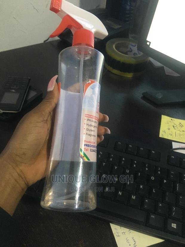 Spraying Rubbing Liquid Sanitizer Bottles With Sprayer · Photo 4