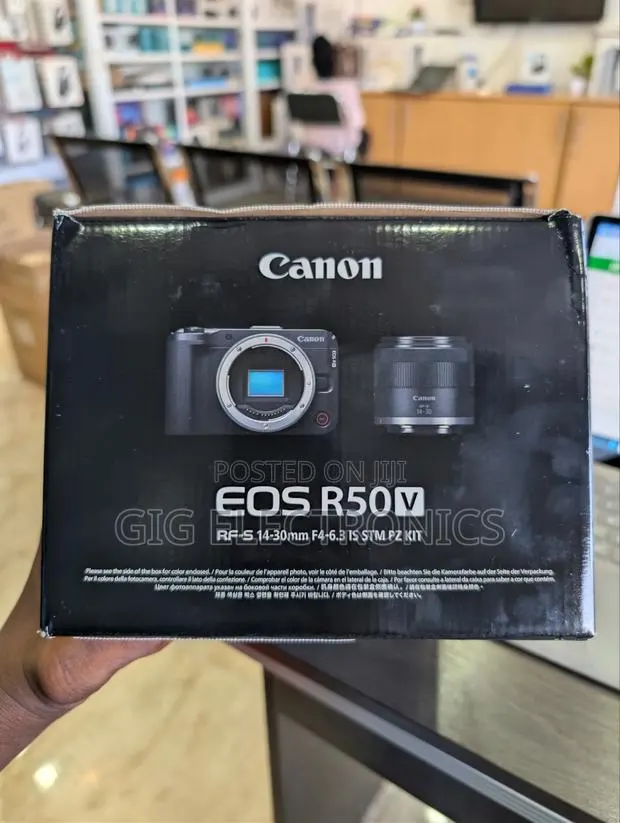 Canon EOS R50 v Mirrorless Camera With 14-30mm F/4-6.3 Lens · Photo 1
