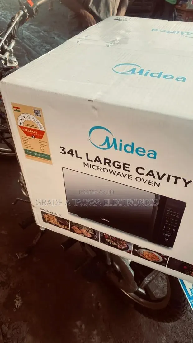 34l Large Media Microwave Grill Oven · Photo 1