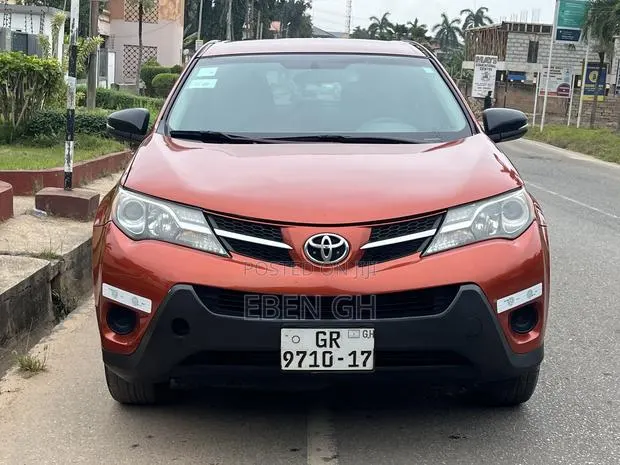 Toyota RAV4 LE 4dr SUV AWD (2.5L 4cyl 6A) 2015 Orange · Photo 1