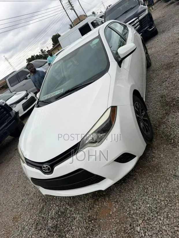 Toyota Corolla L 4dr Sedan (1.8L 4cyl 4A) 2014 White · Photo 1
