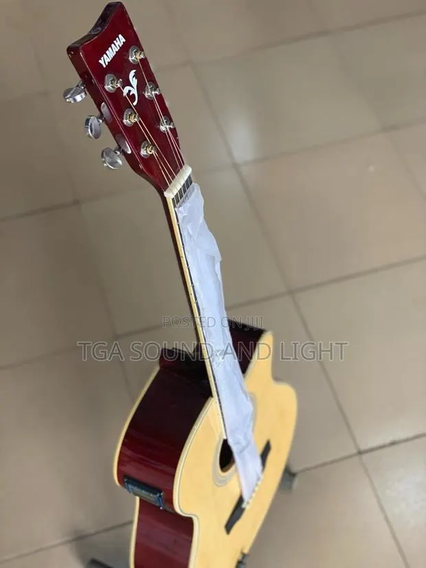 Yamaha Dreadnought Cutaway Semi-Acoustic Guitar. · Photo 1