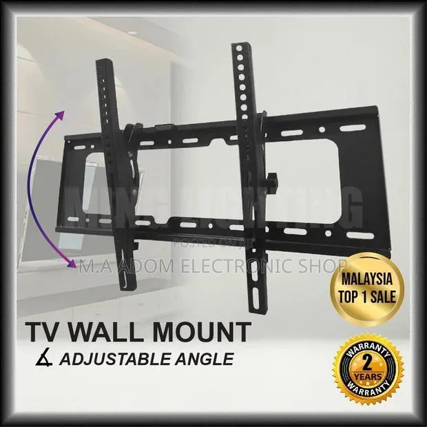 Tilting Wall Mount for Tv Screens Between 32”-65” · Photo 1