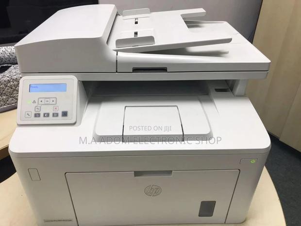 3 in 1 (Copy,Print,Scan) Hp Laser Jet Pro Sdn Printer · Photo 1