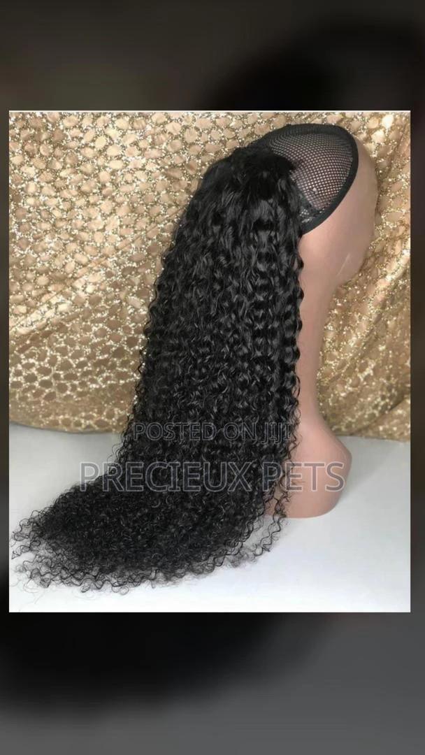 Pony Tail Kinky Curls · Photo 1