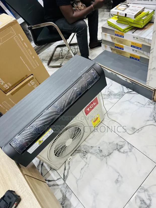 Call and Place Your Order for TCL 1.5hp Inverter Dark Grey · Photo 1