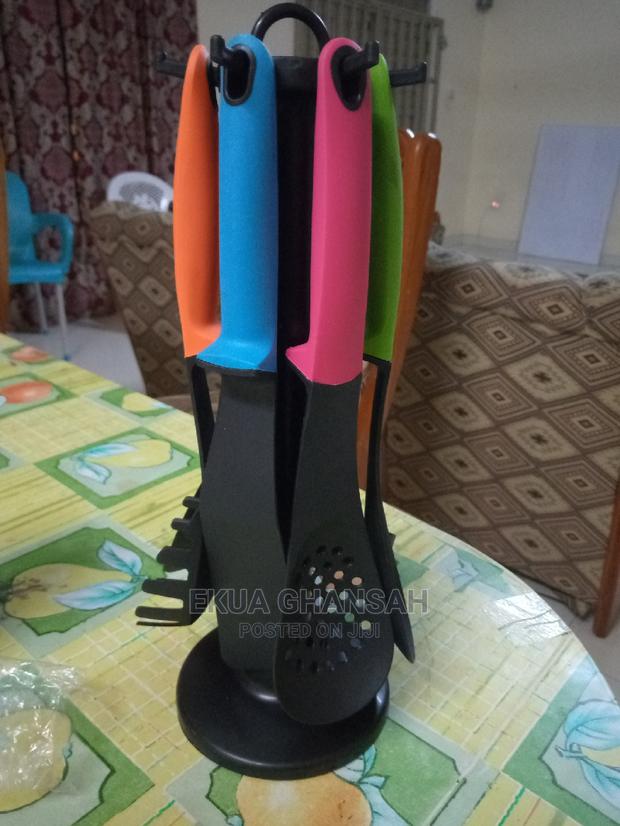 Laddle Set With Rotating Stand. · Photo 1