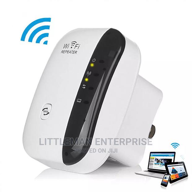 Wireless Wifi Booster Repeater Range Extender · Photo 1