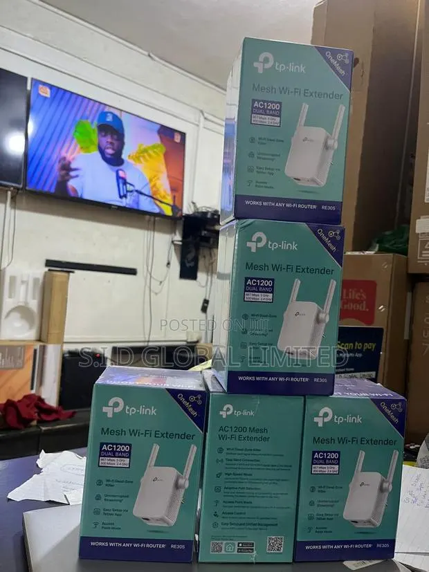 Boost Your Wi-Fi Up to AC1200 Speeds With TP-Link Wifi Extender · Photo 1