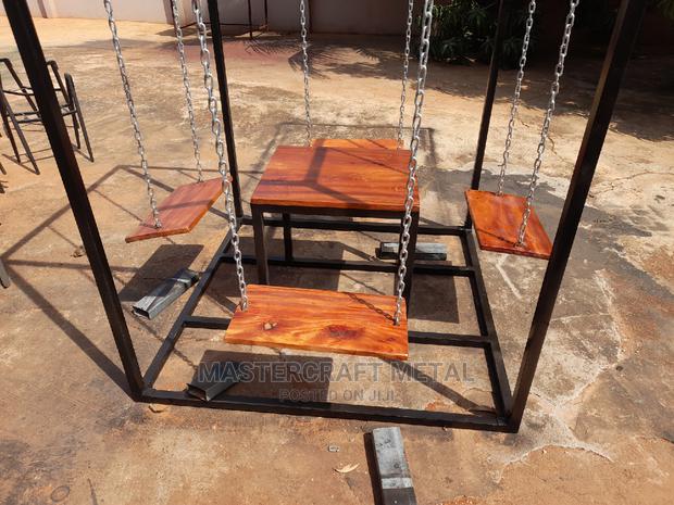 4 in 1 Outdoor Swing Table/ Chairs/ Furniture · Photo 1