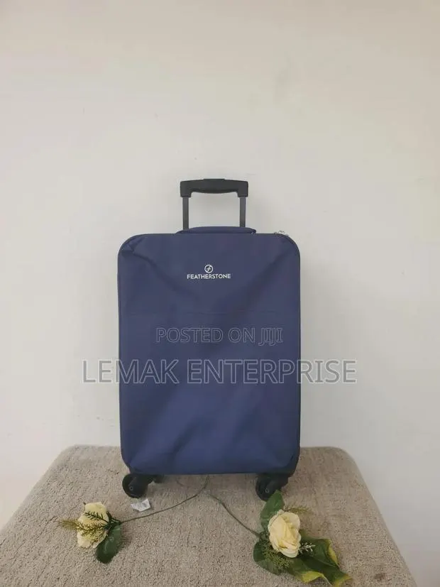 Featherstone 4-Wheel Soft Suitcase/ Traveling Bag. Color Navy Blue. · Photo 1