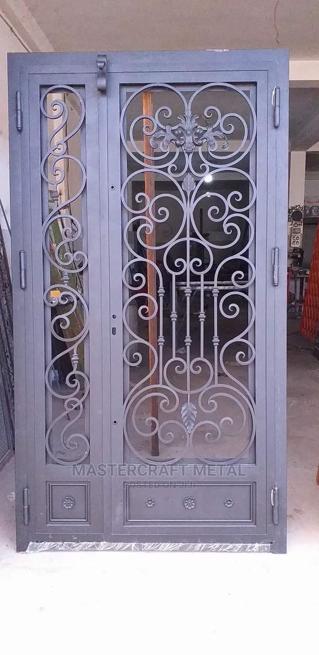 Quality Wrought Iron Security Door With Glass · Photo 1