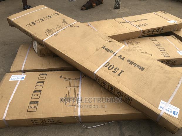 Adjustable Tray Mobile TV Cart Rolling TV Floor Stand · Photo 1