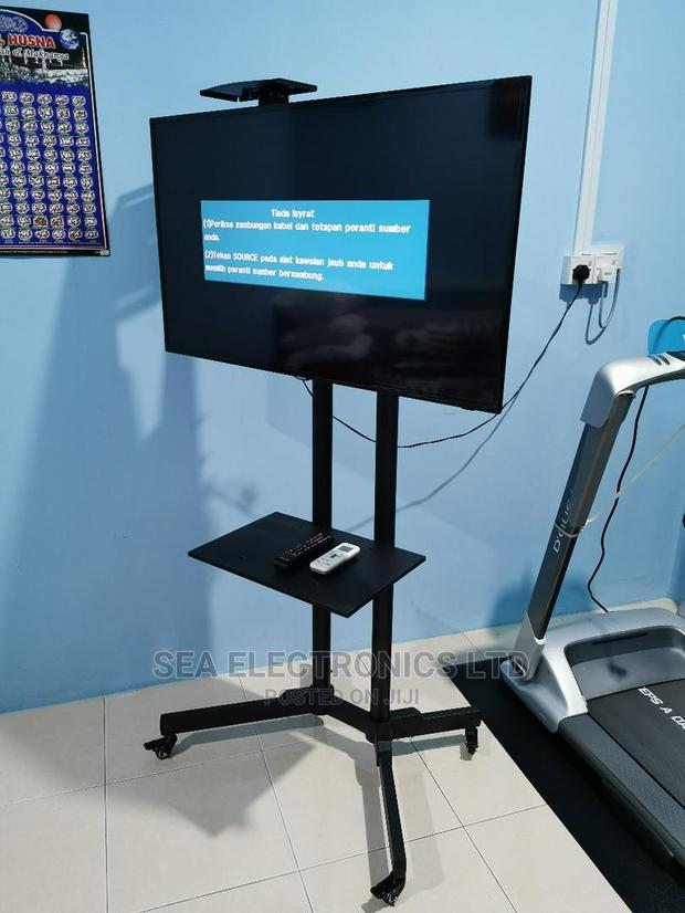 Extremely Floor Standing Tv Stand 32-65 Inch · Photo 1