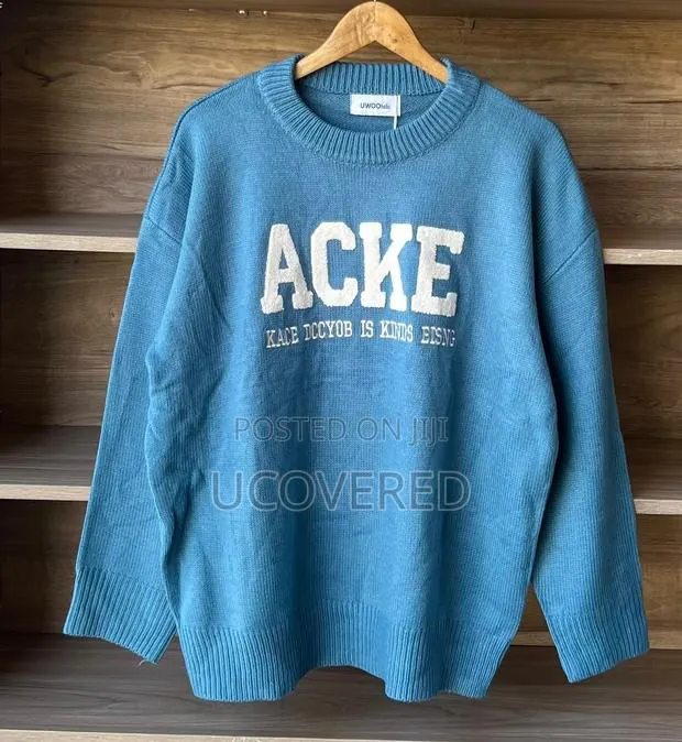 Branded Knit Sweater · Photo 1