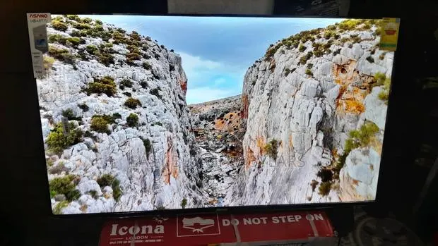 Asano 50” Tv – Where Style Meets Stunning Clarity · Photo 1
