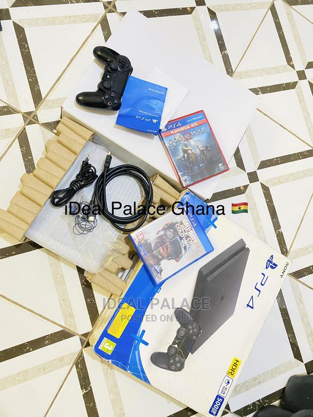 1TB Pre- Owned New Playstation 4 Slim · Photo 1