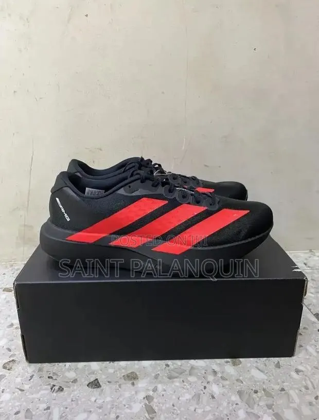 The Adidas Adizero EVO SL Running Sneakers in a Black and Lucid Red · Photo 1