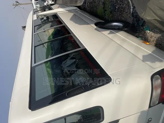 Toyota Coaster 2012 White · Photo 7