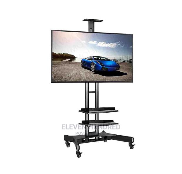 TV Stand (From 32inch to 65inch )Heavy Duty Poles · Photo 1