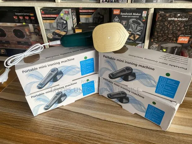 Mini Steam Iron With Gold Plate(No Hassle) · Photo 1
