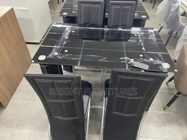 Glass Dining Table With 4 Leather Chairs · Photo 1