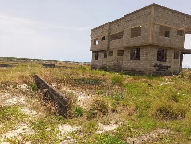Half Plot of Land at Community 25 · Photo 1