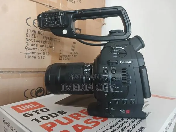Canon C100 With 18-135mm Lens · Photo 1
