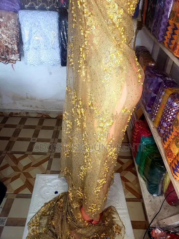 Premium Unique Sequinned Embroidery Lace Fabric · Photo 1
