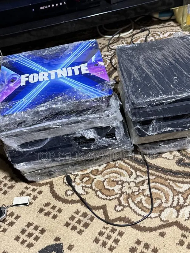 PlayStation 4 Slim Special Edition With 20 Games · Photo 1
