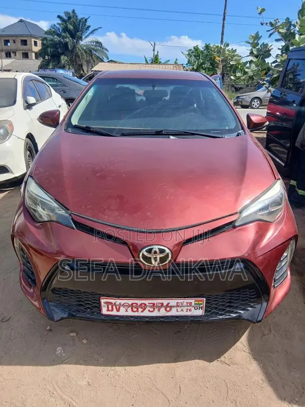 Toyota Corolla L 4dr Sedan (1.8L 4cyl 4A) 2015 Red · Photo 1