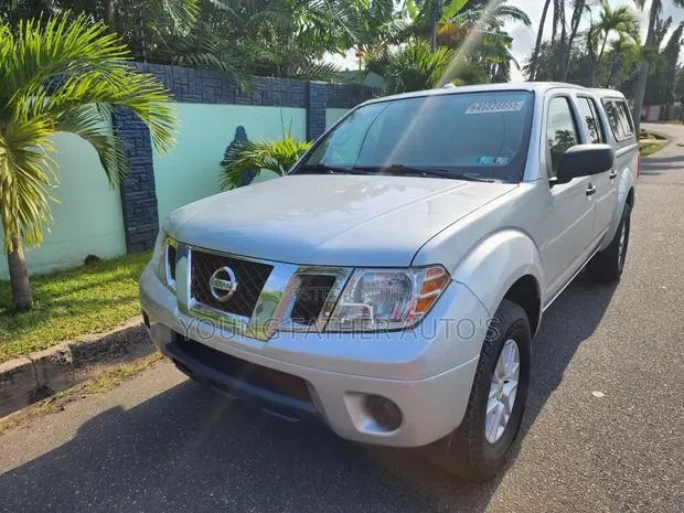 Nissan Frontier SL 4x4 Crew Cab 6 ft. box 139.9 in. WB 2016 Gray · Photo 1