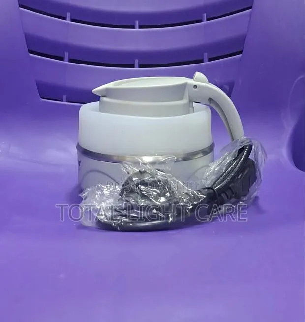 0.6 Liters Hoffmans Travel Folding Electric Kettle · Photo 1