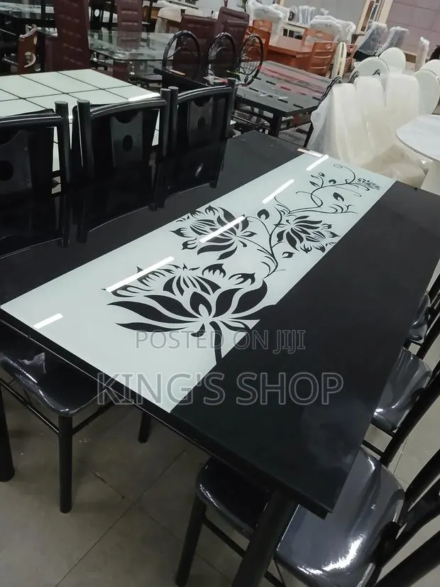 A Firm Glass Dining Table · Photo 1