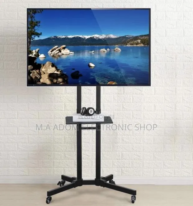 Tilting Mobile Tv Stand 32”-70” · Photo 1
