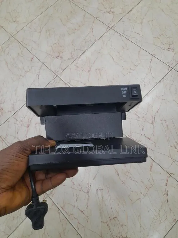 Counterfeit Currency Detector · Photo 2