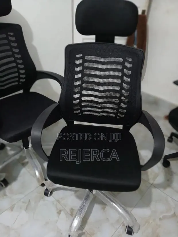 Office Swivel Chair With Head Rest · Photo 1