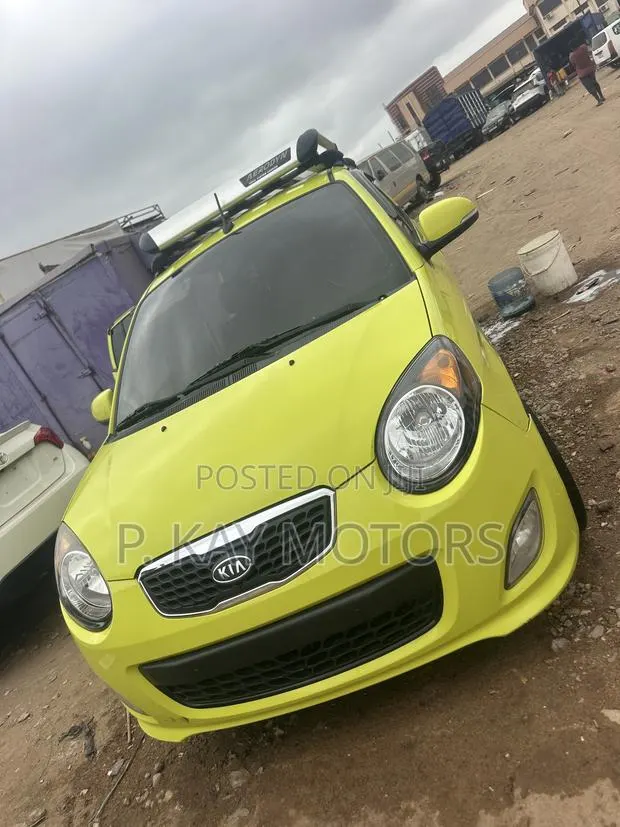 Kia Morning 2010 Yellow · Photo 1