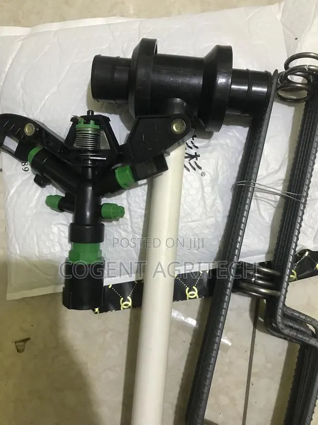 Sprinkler With Pole, Coupling and Stand · Photo 1