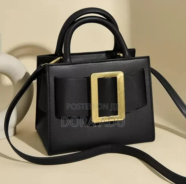Structured Buckle Handbag. · Photo 1