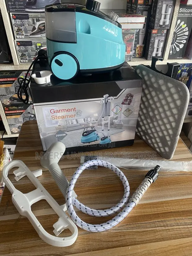 Garment Steamer Machine,Perfect for Suits and Dresses · Photo 1