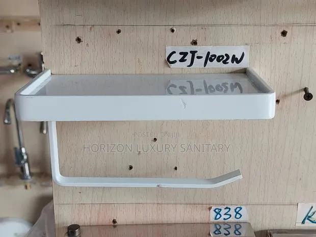 Modern White Tiolet Roll Holder With Phone Shelf · Photo 1